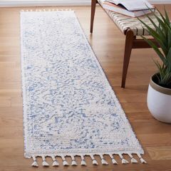 Ivory/Blue Tasseled Pattern Area Rug