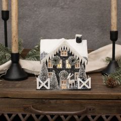Lighted Snow Covered Craftsman Village House