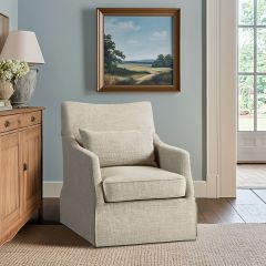 Skirted Upholstered Swivel Armchair