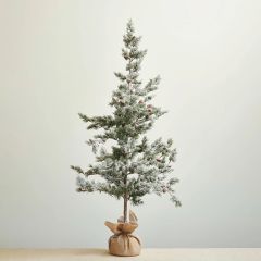 Snowy Evergreen Tree in Burlap Sack