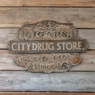 City Drug Store Embossed Metal Sign