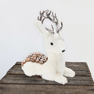 Decorative Deer Laying With Pinecones