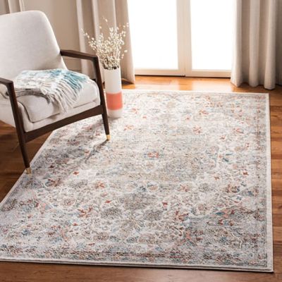 Faded Floral Motif Area Rug