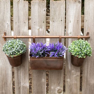 Hanging Metal Planters On Copper Rail