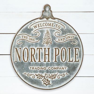 Round Ornament North Pole Trading Company Sign
