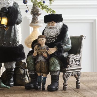 Sitting Santa and Child Figurine