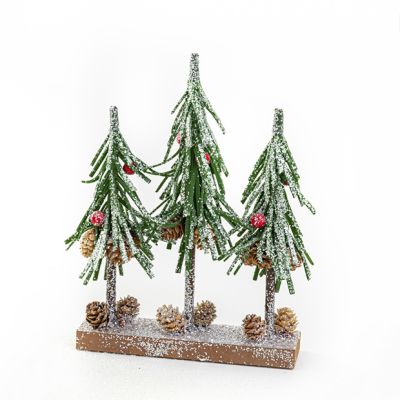 Snow Covered Artificial Trees On Wood Base