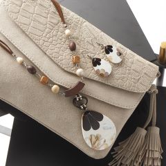 Around Town Ivory Purse with Tassel Charm