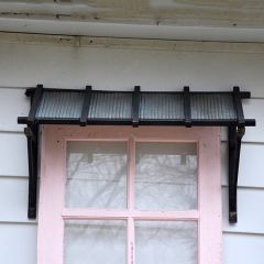 Dark Metal Slat Style Awning