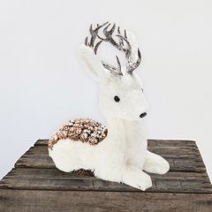 Decorative Deer Laying With Pinecones