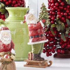 Glittered Santa on Sled Figurine