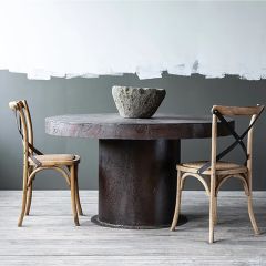 Repurposed Cast Iron Boiler Dining Table