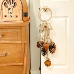 Rustic Jingle Bells And Pinecone Door Hanger