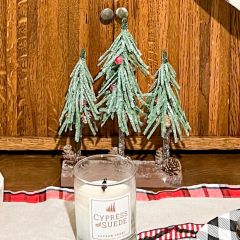 Snow Covered Artificial Trees On Wood Base