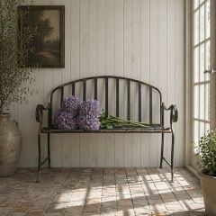 Weathered Black Metal Garden Bench