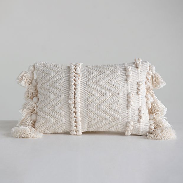 https://www.antiquefarmhouse.com/media/catalog/product/cache/87f7a85cd0f3ed2c3dff34ce326cd3a5/t/e/textured-chevron-and-stripe-lumbar-pillow-with-tassels_1.jpg