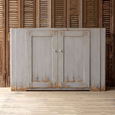 Heavily Distressed Pale Hued Storage Cabinet