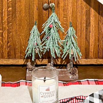 Snow Covered Artificial Trees On Wood Base