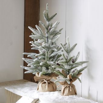 Snow Flocked Tree With Pinecones In Burlap Bag