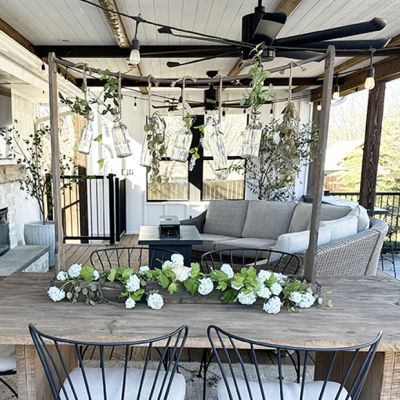 Bottle Garland Vase On Wooden Centerpiece