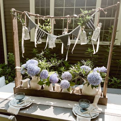 Bottle Garland Vase On Wooden Centerpiece