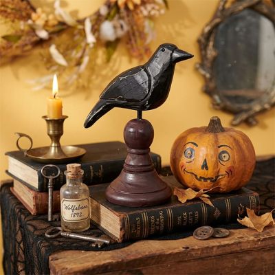 Carved Black Crow on Spindle