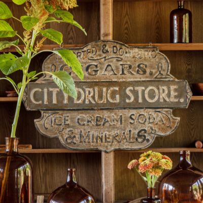 City Drug Store Embossed Metal Sign