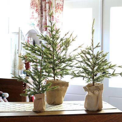 Faux Woodland Fir In Burlap Wrapped Base