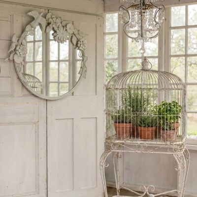 Round Wall Mirror with Ornate Floral And Bird Accents