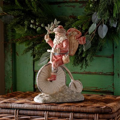 Santa on Bike Christmas Figurine