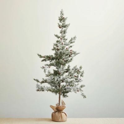 Snowy Evergreen Tree in Burlap Sack
