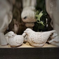 Carved Cement Bird Candle Holder