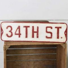 34th St. Holiday Street Sign