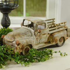 Rusted White Metal Vintage Truck