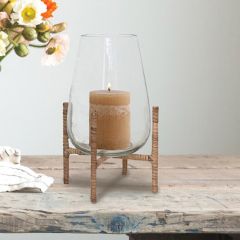 Sleek Glass Vase With Rattan Wrapped Stand