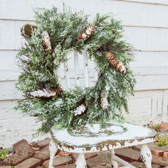 Snow Flocked Cedar And Pinecone Wreath