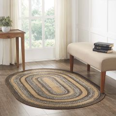 Warm and Neutral Oval Braided Jute Area Rug With Pad