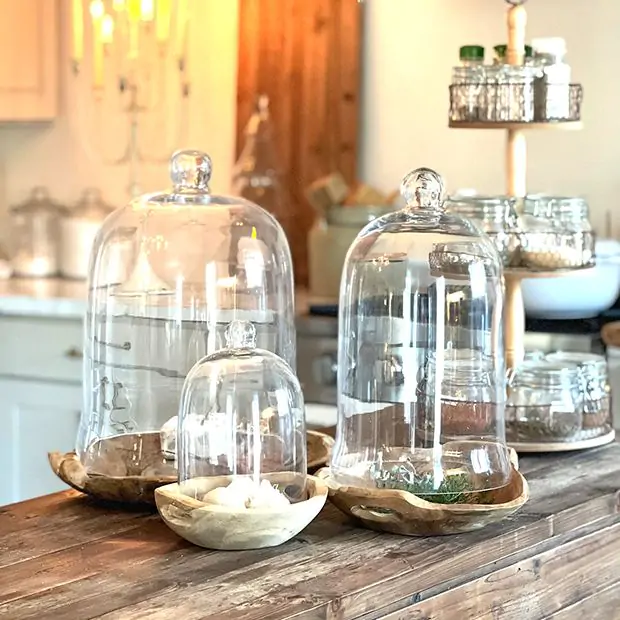 Glass bell jars with LED lighting elements inside creating ambiance