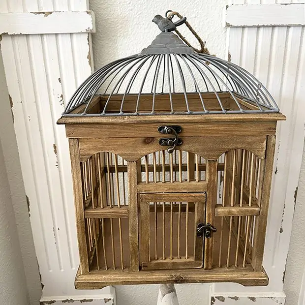 Decorative wooden bird cages top