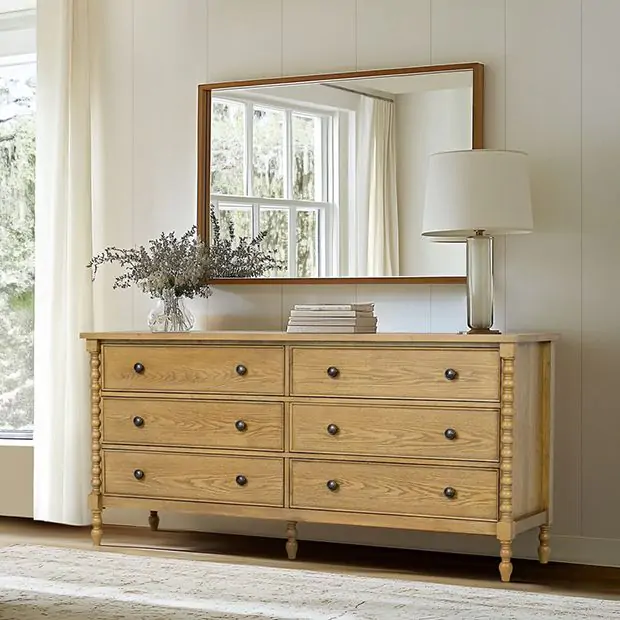 dresser legs Adding To Furniture for a Total Transformation! shaped design not only adds a modern touch but also facilitates easier access to and from sofas or beds Modern Dresser with Cane Drawers