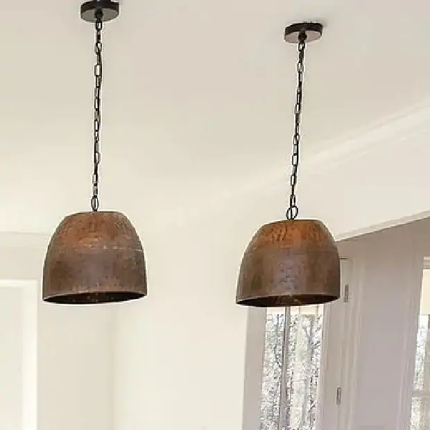 Weathered metal hanging light top